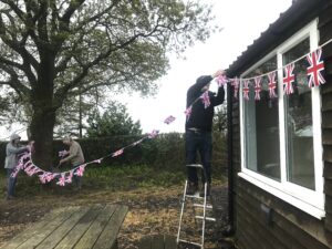 volunteers putting up bunting